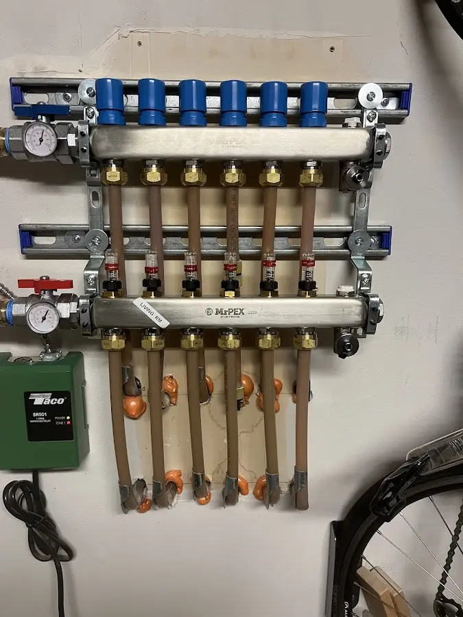 Plumber performing Water Heater Repair at a residential property in Pitman